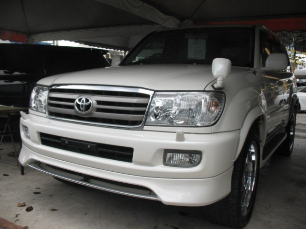 Накладка на передний бампер (сток) Toyota Land Cruiser 100 купить недорого с доставкой в Копейск