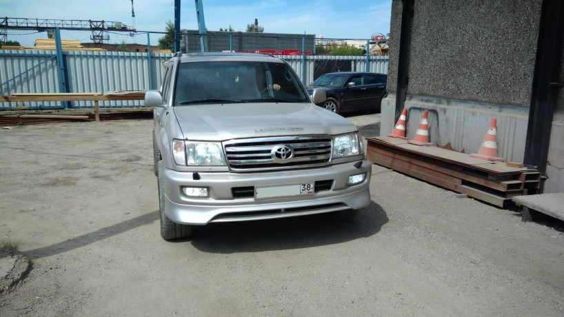 Накладка на передний бампер (сток) Toyota Land Cruiser 100 купить недорого с доставкой в Копейск