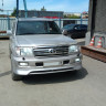Накладка на передний бампер (сток) Toyota Land Cruiser 100 купить недорого с доставкой в Копейск
