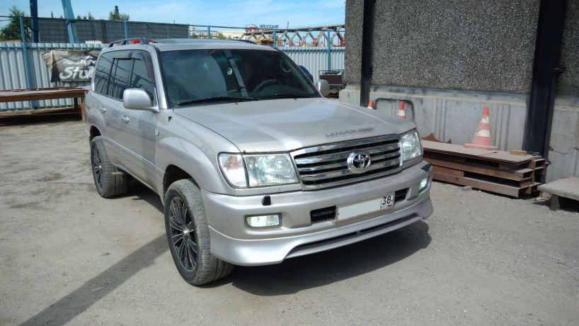 Накладка на передний бампер (сток) Toyota Land Cruiser 100 купить недорого с доставкой в Копейск