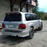 Накладки на задний бампер (сток) Toyota Land Cruiser 100 купить недорого с доставкой в Копейск